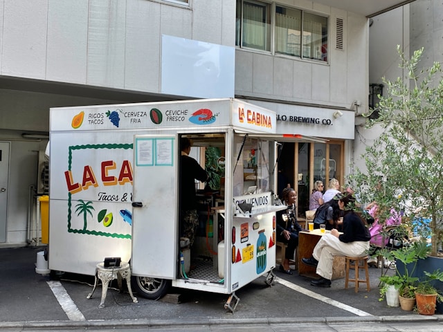 Food truck serving tacos at a catered corporate event booked through Food Truck Club