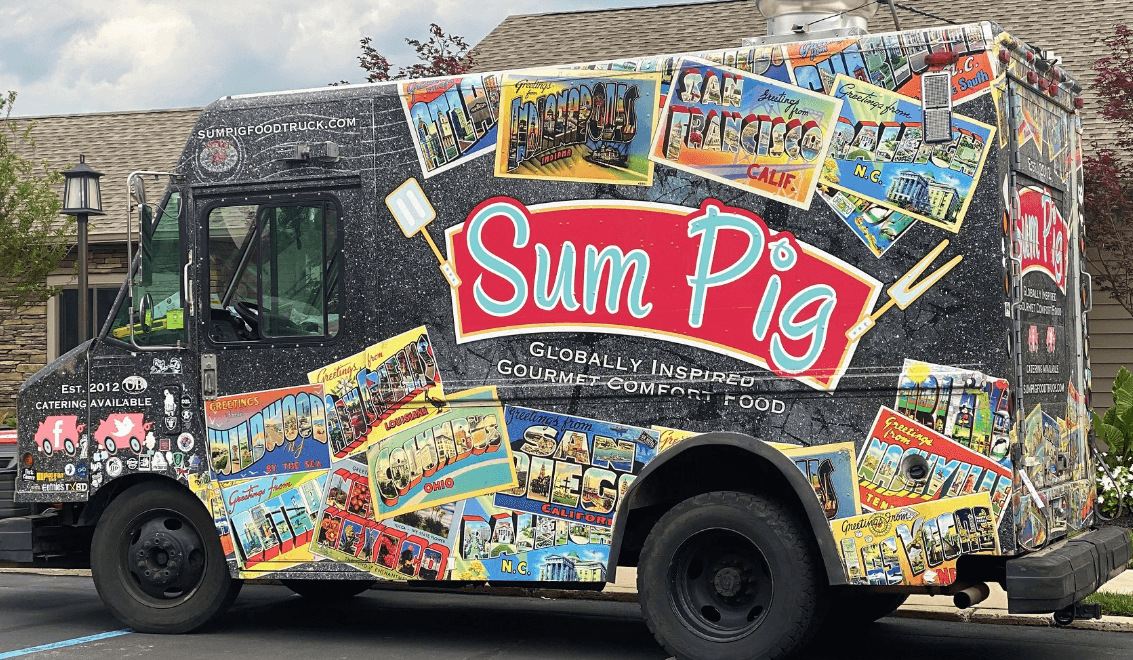 Food truck set up and serving at a catered outdoor event